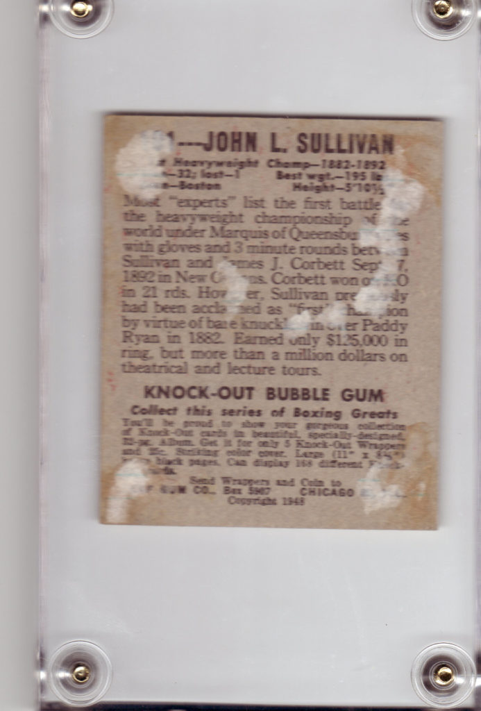 Image description: the back of a 1948 Leaf Boxing John L. Sullivan trading card. Some paper is stuck to the card, as it was glued into an album and removed from it. Text on back of card is transcribed in image caption.